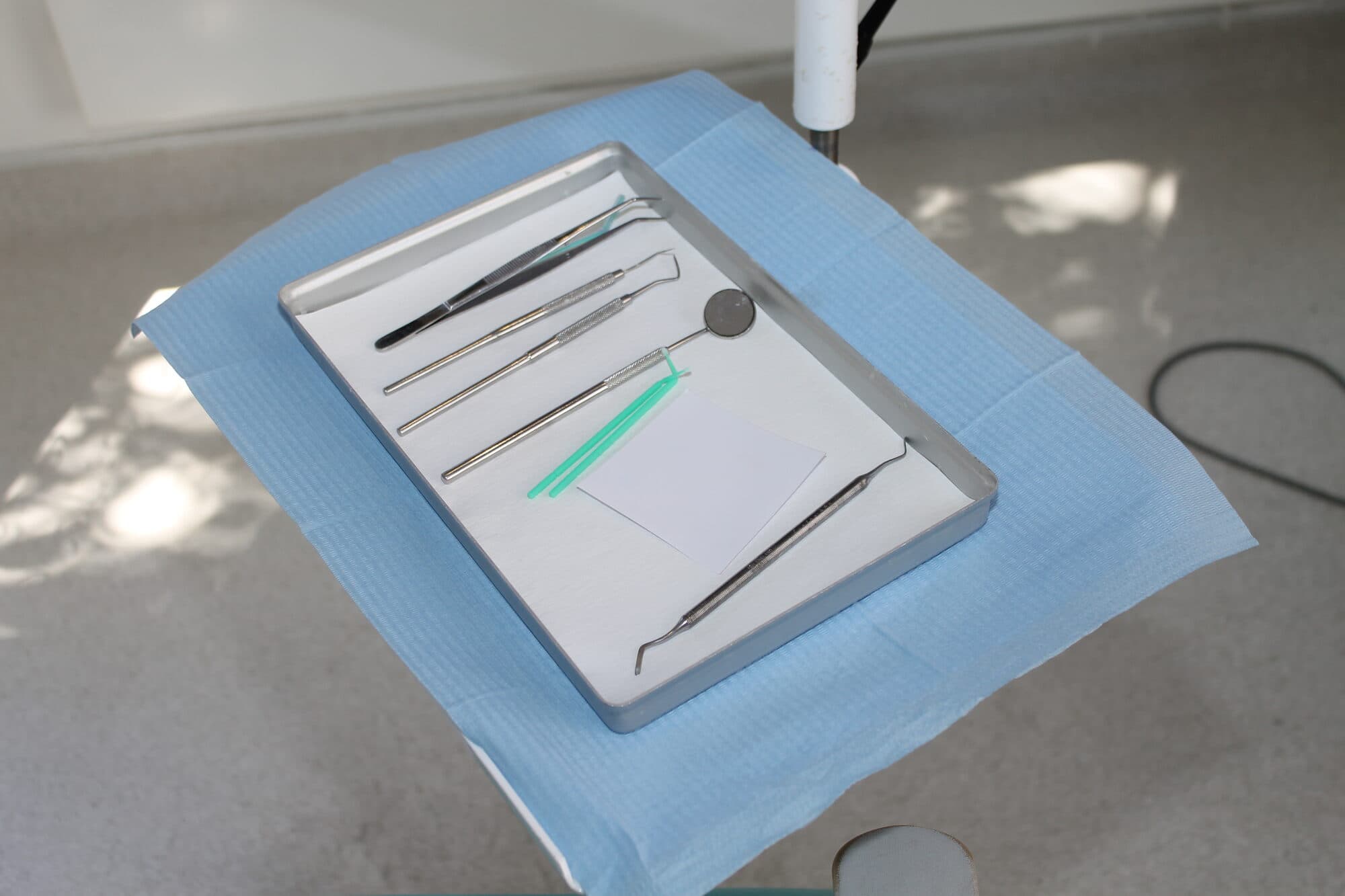 A tray of sterile dental instruments at Hermes London Dental Clinic